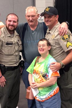 Police officers interacting with people with special needs
